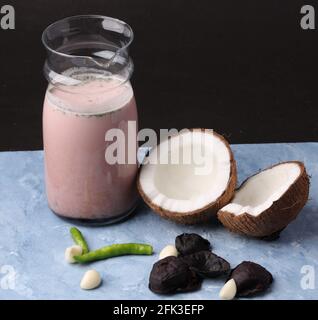 Solkadhi OR Kokum curry, A famous drink from Goa or Maharashtra`s Konkan region, served in a glass Stock Photo